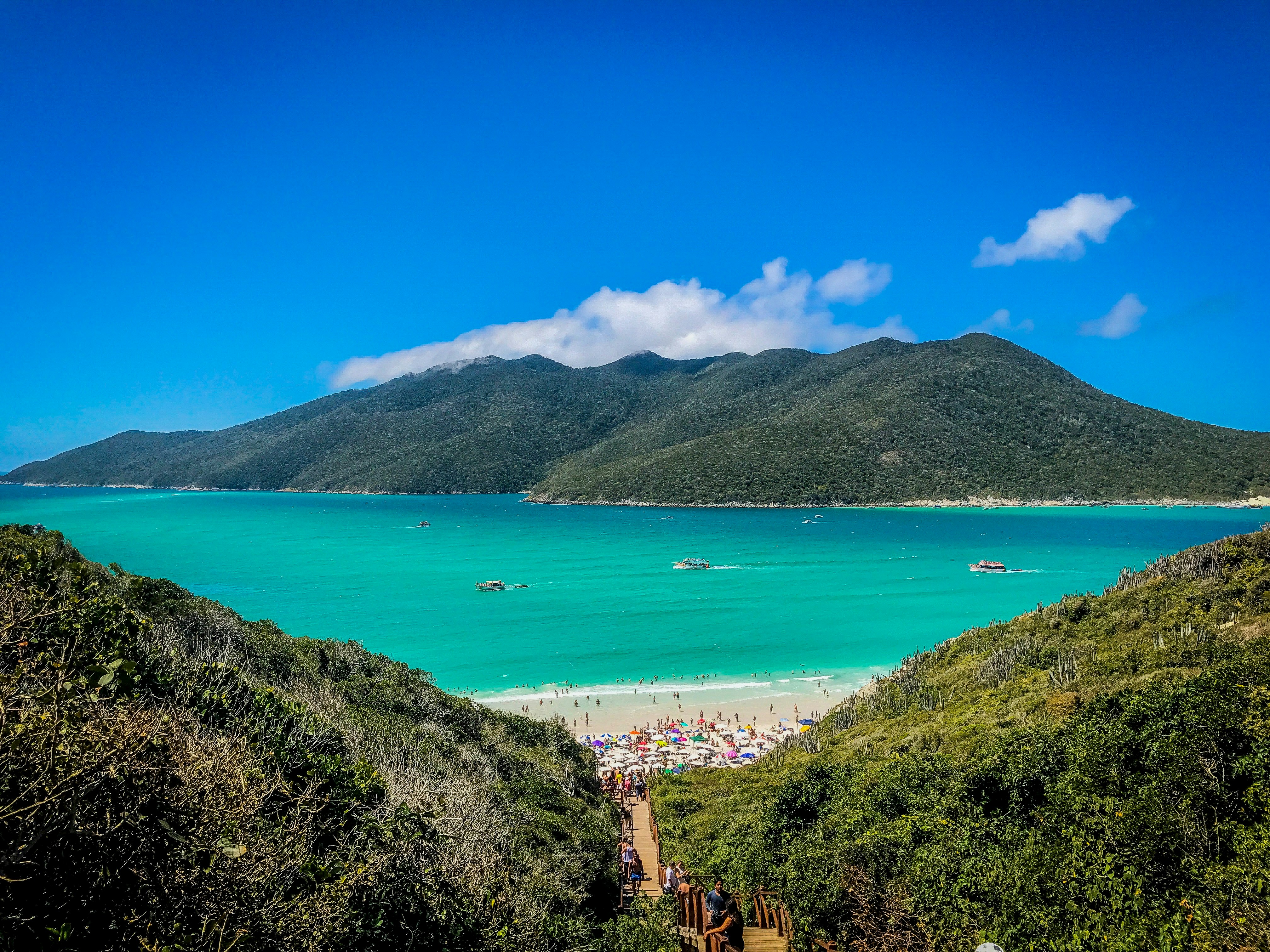 Crystal-clear turquoise waters and soft white sands of a secluded beach in Florianopolis